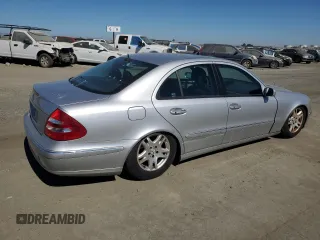 2003 Mercedes-Benz E-Class 3.2L with VIN WDBUF65JX3A096821, listed as a Copart auction lot 74378684 with 157,088 mi miles and Clean Title. Bid and sale history available at carsss.com. Image 3.