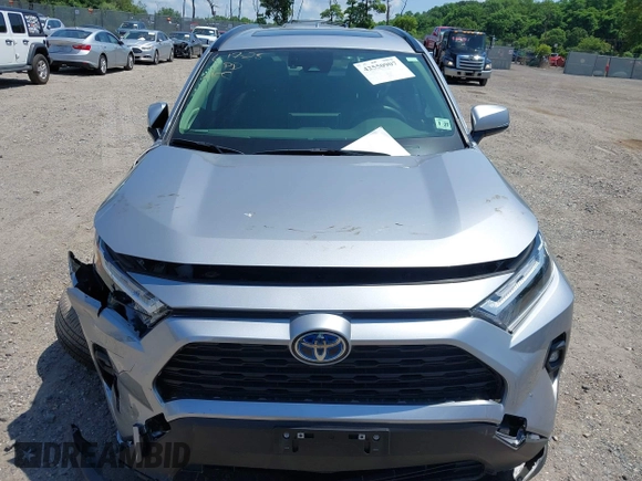 2022 Toyota RAV4 Hybrid XLE Premium with VIN JTMB6RFV1ND063963, listed as a IAAI auction lot 42550907 with 35,012 mi miles and . Bid and sale history available at DreamBid. Image 12.
