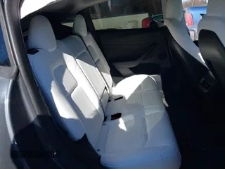 2023 Tesla Model Y Performance with VIN 7SAYGDEF1PF674417, listed as a IAAI auction lot 41421594 with 28,928 mi miles and . Bid and sale history available at DreamBid. Image 8.