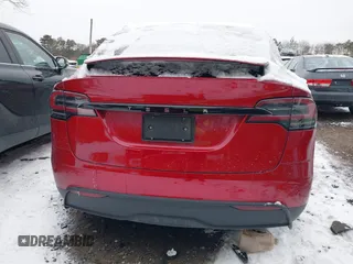 2023 Tesla Model X with VIN 7SAXCBE51PF404297, listed as a IAAI auction lot 41314595 with 25,020 mi miles and . Bid and sale history available at DreamBid. Image 16.