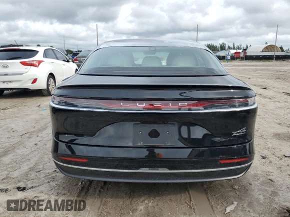 2022 Lucid Air Grand Touring z VIN 50EA1GBA6NA001280, wystawiony jako Copart lot #74004994 z przebiegiem Nie podano mil oraz Szkody całkowita. Historia ofert i sprzedaży dostępna na DreamBid. Obrazek 6.