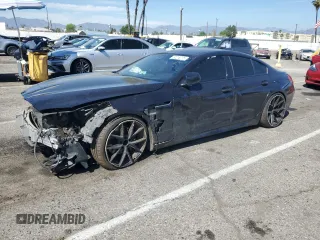 2014 BMW 6 Series 650i z VIN WBA6B2C56ED129428, wystawiony jako Copart lot #52216775 z przebiegiem 99 673 mil mil oraz Szkoda całkowita • Salvage title. Historia ofert i sprzedaży dostępna na DreamBid. Obrazek 1.