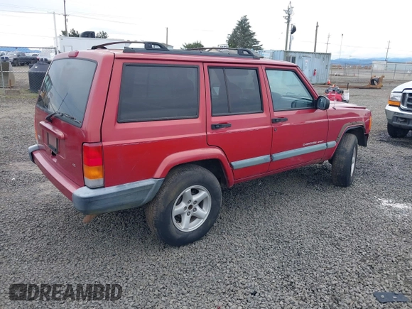 1999 Jeep Cherokee Sport with VIN 1J4FT68S1XL596443, listed as a IAAI auction lot 41767289 with 192,826 mi miles and . Bid and sale history available at DreamBid. Image 4.