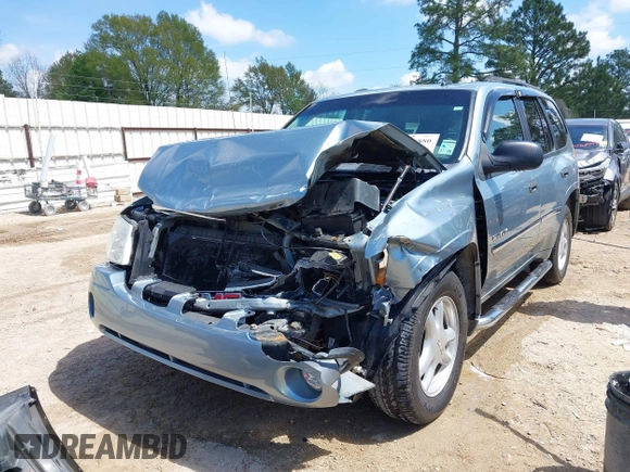 2006 GMC Envoy SLE with VIN 1GKDS13S362310613, listed as a IAAI auction lot 41881880 with 202,893 mi miles. Bid and sale history available at carsss.com. Image 6.