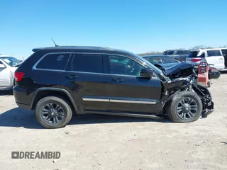2013 Jeep Grand Cherokee Laredo with VIN 1C4RJFAG2DC643926, listed as a IAAI auction lot 41723575 with 125,048 mi miles. Bid and sale history available at carsss.com. Image 13.