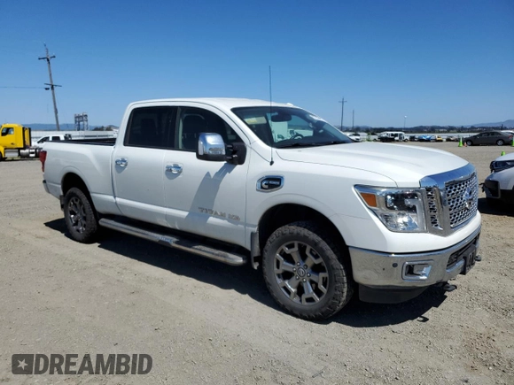 2017 Nissan Titan Pro-4X z VIN 1N6BA1F40HN559615, wystawiony jako Copart lot #57636455 z przebiegiem 99 803 mil mil oraz Szkoda całkowita • Salvage title. Historia ofert i sprzedaży dostępna na DreamBid. Obrazek 4.