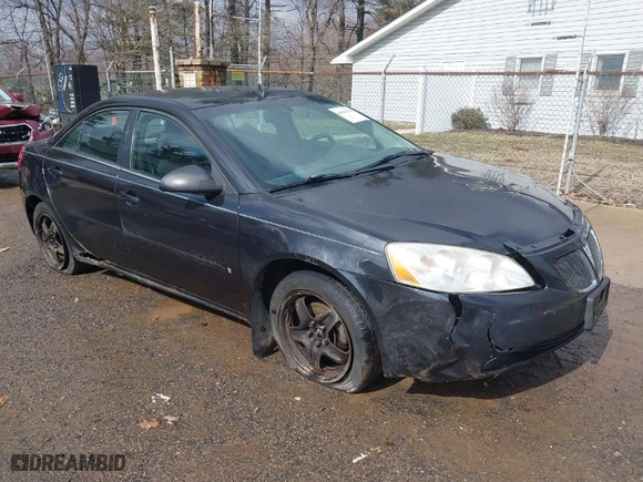 2009 Pontiac G6 w/1SA *Ltd Avail* with VIN 1G2ZG57B994161559, listed as a IAAI auction lot 41667511 with 154401 miles. Bid and sale history available at carsss.com. Image 1.