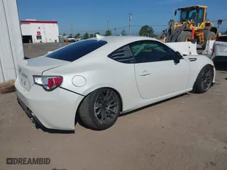 2013 Subaru BRZ Premium with VIN JF1ZCAB16D1611263, listed as a IAAI auction lot 42097250 with 122,071 mi miles. Bid and sale history available at carsss.com. Image 4.