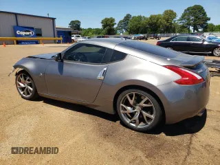 2014 Nissan 370Z Nismo with VIN JN1AZ4EH7EM633324, listed as a Copart auction lot 53812335 with 57,856 mi miles and Salvage Title. Bid and sale history available at DreamBid. Image 2.
