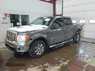 2011 Ford F-150 XLT with VIN 1FTFW1ET4BFB50467, listed as a IAAI auction lot 41608114 with 201,858 mi miles. Bid and sale history available at carsss.com. Image 2.