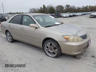 2004 Toyota Camry LE with VIN 4T1BE32K64U359664, listed as a IAAI auction lot 41022232 with 177,973 mi miles and . Bid and sale history available at DreamBid. Image 1.