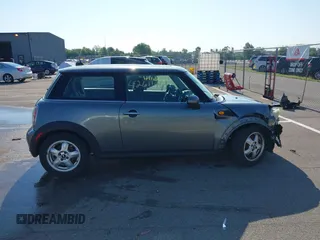 2010 MINI Hardtop with VIN WMWMF3C51ATZ61146, listed as a IAAI auction lot 42611461 with 96,038 mi miles and . Bid and sale history available at DreamBid. Image 12.