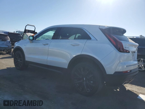 2021 Cadillac XT4 FWD Luxury z VIN 1GYAZAR49MF081955, wystawiony jako Copart lot #76611074 z przebiegiem 34 635 mil mil oraz Szkoda całkowita • Salvage title. Historia ofert i sprzedaży dostępna na DreamBid. Obrazek 2.