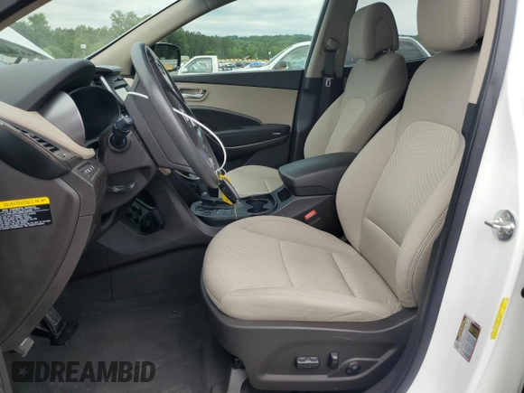 2018 Hyundai Santa Fe 2.4L z VIN 5NMZU3LB6JH104469, wystawiony jako Copart lot #57587495 z przebiegiem 78 267 mil mil oraz Szkoda całkowita • Salvage title. Historia ofert i sprzedaży dostępna na DreamBid. Obrazek 7.