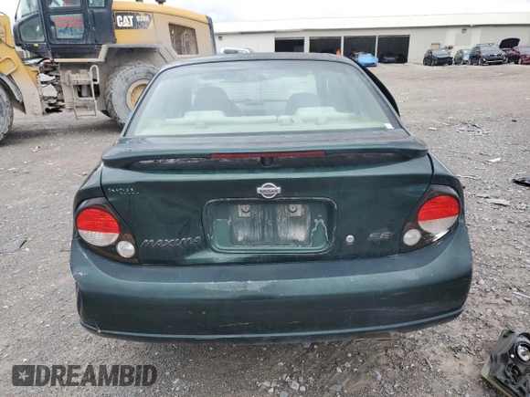2000 Nissan Maxima GXE z VIN JN1CA31D7YT522165, wystawiony jako Copart lot #47566965 z przebiegiem 336 529 mil mil oraz Czysty tytuł • Clean title. Historia ofert i sprzedaży dostępna na DreamBid. Obrazek 6.