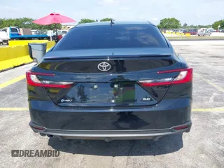 2025 Toyota Camry LE with VIN 4T1DAACK8SU125496, listed as a IAAI auction lot 42206200 with 937 mi miles and . Bid and sale history available at DreamBid. Image 17.