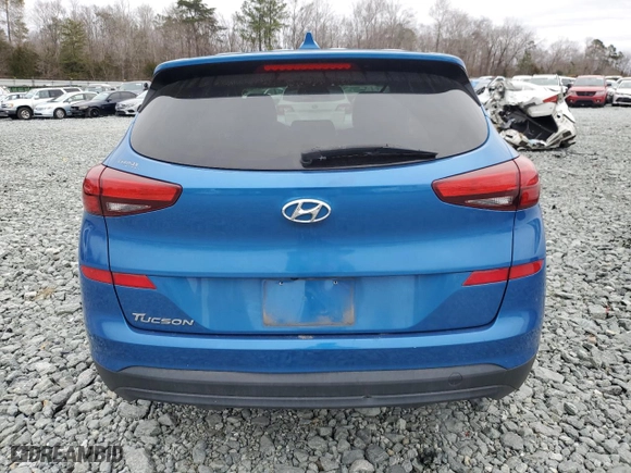 2019 Hyundai Tucson SE with VIN KM8J23A42KU956802, listed as a Copart auction lot 43928345 with 105,628 mi miles and Salvage Title. Bid and sale history available at carsss.com. Image 6.