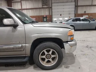 2001 GMC Yukon XL SLE with VIN 1GKFK16T11J220078, listed as a IAAI auction lot 41814254 with 221,210 mi miles. Bid and sale history available at carsss.com. Image 12.