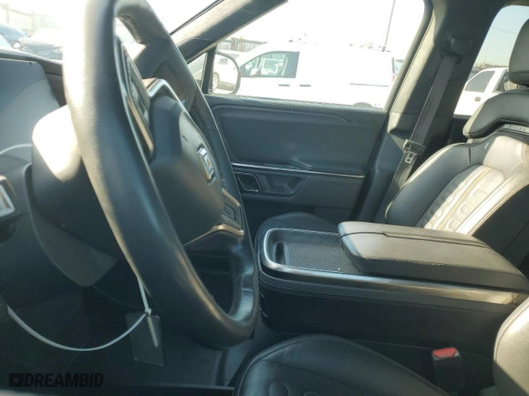 2022 Rivian R1T Adventure Package with VIN 7FCTGAAA9NN014280, listed as a Copart auction lot 49723355 with 0 mi miles and Salvage Title. Bid and sale history available at carsss.com. Image 8.
