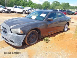 2014 Dodge Charger SE z VIN 2C3CDXBG5EH315467, wystawiony jako IAAI lot #42273742 z przebiegiem 153 493 mil mil oraz . Historia ofert i sprzedaży dostępna na DreamBid. Obrazek 2.