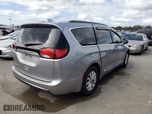 2017 Chrysler Pacifica Touring L with VIN 2C4RC1BG2HR552731, listed as a Copart auction lot 75826124 with Not Provided miles and Salvage Title. Bid and sale history available at DreamBid. Image 3.