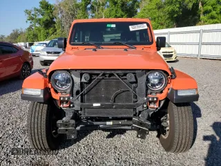 2023 Jeep Wrangler Sahara with VIN 1C4HJXEN4PW620113, listed as a Copart auction lot 50839455 with 34,777 mi miles and Salvage Title. Bid and sale history available at carsss.com. Image 5.