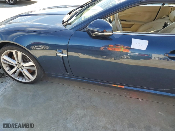 2010 Jaguar XK with VIN SAJWA4GB5ALB36425, listed as a Copart auction lot 74035264 with 0 mi miles and Salvage Title. Bid and sale history available at carsss.com. Image 12.