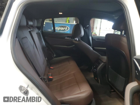 2023 BMW X4 xDrive30i with VIN 5UX33DT07P9P12954, listed as a Copart auction lot 42596275 with 27,590 mi miles and Salvage Title. Bid and sale history available at carsss.com. Image 11.