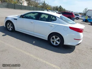 2015 Kia Optima LX with VIN KNAGM4A76F5597167, listed as a IAAI auction lot 41896660 with 82,939 mi miles. Bid and sale history available at carsss.com. Image 3.
