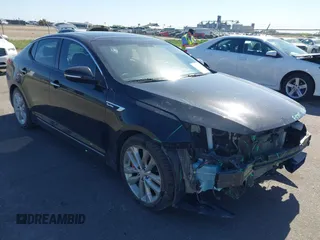 2014 Kia Optima SXL Turbo with VIN 5XXGR4A63EG284325, listed as a IAAI auction lot 42228083 with 139,458 mi miles and . Bid and sale history available at DreamBid. Image 1.