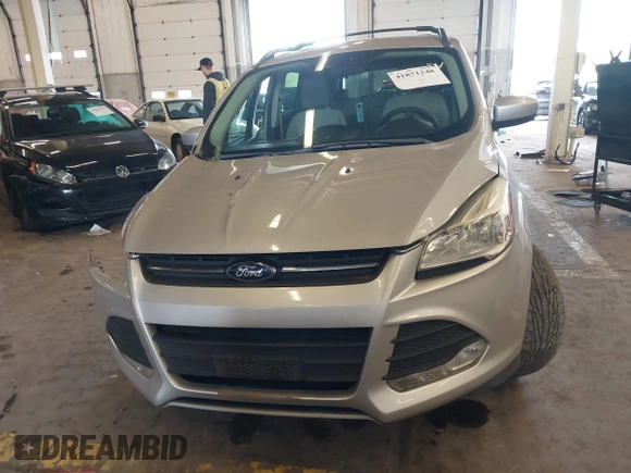 2013 Ford Escape SE z VIN 1FMCU9GX8DUD56926, wystawiony jako IAAI lot #41871248 z przebiegiem 36 807 mil mil oraz . Historia ofert i sprzedaży dostępna na DreamBid. Obrazek 12.