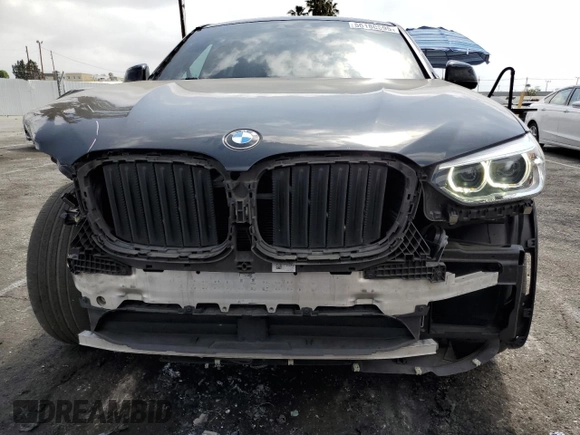 2020 BMW X4 xDrive30i z VIN 5UX2V1C0XL9B93562, wystawiony jako Copart lot #56180595 z przebiegiem 71 667 mil mil oraz Szkoda całkowita • Salvage title. Historia ofert i sprzedaży dostępna na DreamBid. Obrazek 5.