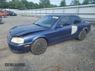 2002 Kia Optima LX z VIN KNAGD126825178378, wystawiony jako Copart lot #58880974 z przebiegiem 175 304 mil mil oraz Szkoda całkowita • Salvage title. Historia ofert i sprzedaży dostępna na DreamBid. Obrazek 1.