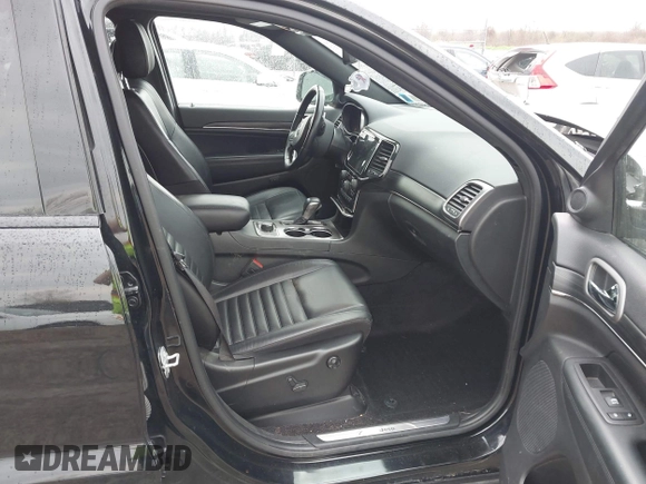 2021 Jeep Grand Cherokee 80th Anniversary with VIN 1C4RJFBG7MC828116, listed as a IAAI auction lot 42118355 with 57,240 mi miles and . Bid and sale history available at DreamBid. Image 5.