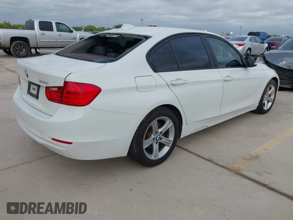 2015 BMW 3 Series 320i with VIN WBA3B1C50FK139723, listed as a IAAI auction lot 42035410 with 185,169 mi miles and . Bid and sale history available at DreamBid. Image 4.