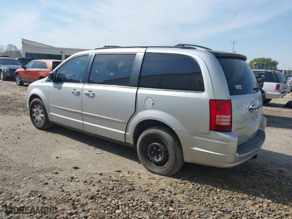 2010 Chrysler Town & Country LX with VIN 2A4RR4DE2AR113041, listed as a IAAI auction lot 41912924 with 200,143 mi miles. Bid and sale history available at carsss.com. Image 3.