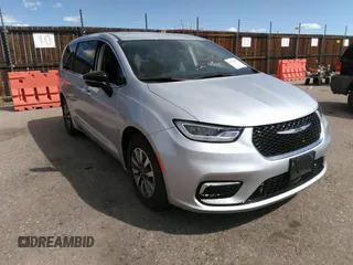2024 Chrysler Pacifica Hybrid Select z VIN 2C4RC1S79RR147502, wystawiony jako IAAI lot #41826075 z przebiegiem 30 911 mil mil oraz . Historia ofert i sprzedaży dostępna na DreamBid. Obrazek 1.