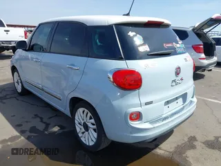 2014 FIAT 500L Lounge with VIN ZFBCFACH4EZ029817, listed as a IAAI auction lot 41909849 with 113,056 mi miles and . Bid and sale history available at DreamBid. Image 3.