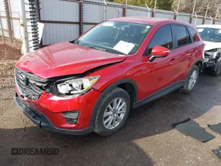 2016 Mazda CX-5 Sport with VIN JM3KE2BY3G0754391, listed as a IAAI auction lot 41719461 with 79,130 mi miles. Bid and sale history available at carsss.com. Image 17.