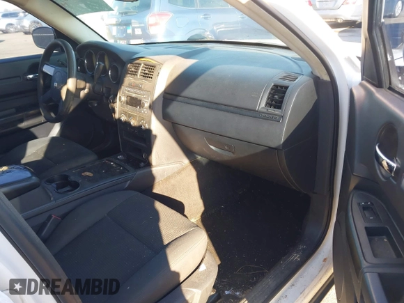 2010 Dodge Charger Police with VIN 2B3AA4CT5AH161604, listed as a IAAI auction lot 41814567 with 195,507 mi miles and . Bid and sale history available at DreamBid. Image 5.