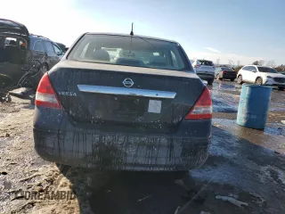 2009 Nissan Versa 1.8 S with VIN 3N1BC11E59L403040, listed as a Copart auction lot 42345715 with 193,671 mi miles and Salvage Title. Bid and sale history available at carsss.com. Image 6.