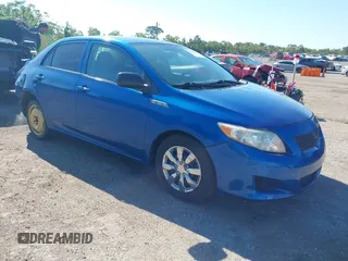 2009 Toyota Corolla with VIN JTDBL40E999021523, listed as a IAAI auction lot 42019856 with 194,011 mi miles. Bid and sale history available at carsss.com. Image 1.