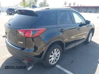 2014 Mazda CX-5 Sport z VIN JM3KE2BE8E0371775, wystawiony jako IAAI lot #42111417 z przebiegiem 150 932 mil mil oraz . Historia ofert i sprzedaży dostępna na DreamBid. Obrazek 4.