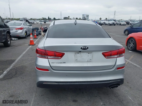 2019 Kia Optima LX with VIN 5XXGT4L3XKG285486, listed as a IAAI auction lot 41872981 with 101,981 mi miles. Bid and sale history available at carsss.com. Image 16.
