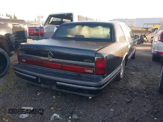 1994 Lincoln Town Car Signature z VIN 1LNLM82W9RY699141, wystawiony jako IAAI lot #41933771 z przebiegiem Nie podano mil oraz . Historia ofert i sprzedaży dostępna na DreamBid. Obrazek 4.