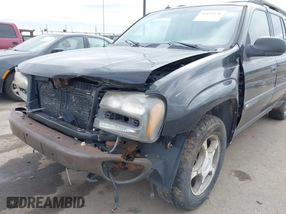 2004 Chevrolet TrailBlazer EXT LT with VIN 1GNET16S746115863, listed as a IAAI auction lot 41453236 with 198,099 mi miles. Bid and sale history available at carsss.com. Image 6.