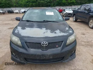 2009 Toyota Corolla with VIN 1NXBU40E19Z135389, listed as a IAAI auction lot 42188550 with 215,054 mi miles. Bid and sale history available at carsss.com. Image 6.