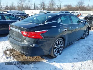 2017 Nissan Maxima SV z VIN 1N4AA6AP1HC434427, wystawiony jako IAAI lot #41607323 z przebiegiem 102 352 mil mil oraz . Historia ofert i sprzedaży dostępna na DreamBid. Obrazek 4.