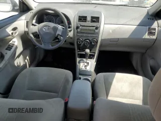 2010 Toyota Corolla with VIN 2T1BU4EE2AC329301, listed as a Copart auction lot 52970705 with 197,823 mi miles and Salvage Title. Bid and sale history available at DreamBid. Image 8.