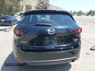 2019 Mazda CX-5 Sport with VIN JM3KFABM7K1509987, listed as a IAAI auction lot 42062804 with 50,898 mi miles and . Bid and sale history available at DreamBid. Image 17.
